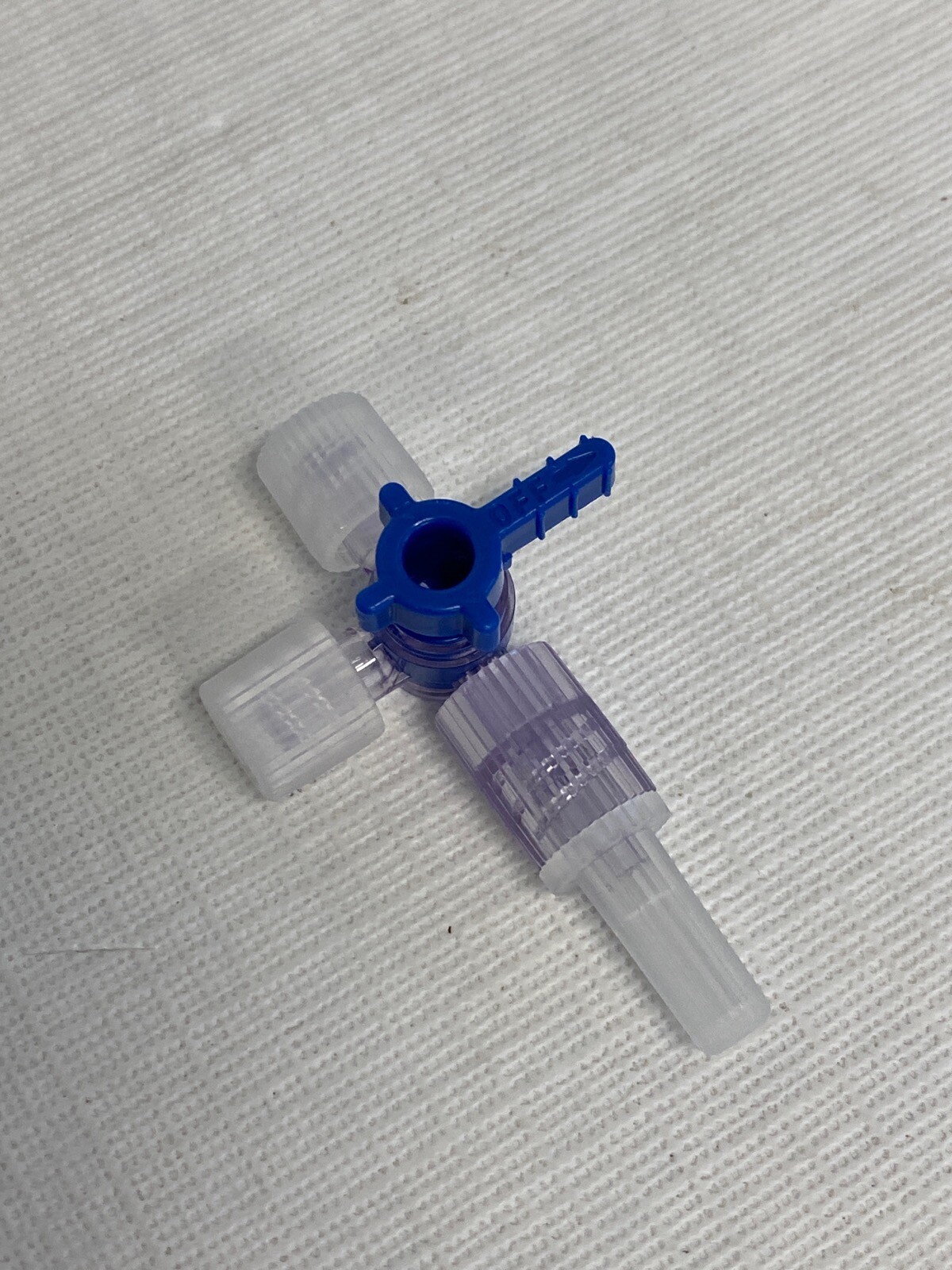(73) VALUE PLASTICS Four-Way Stopcock Capped F Luer to Capped M Luer-Lock