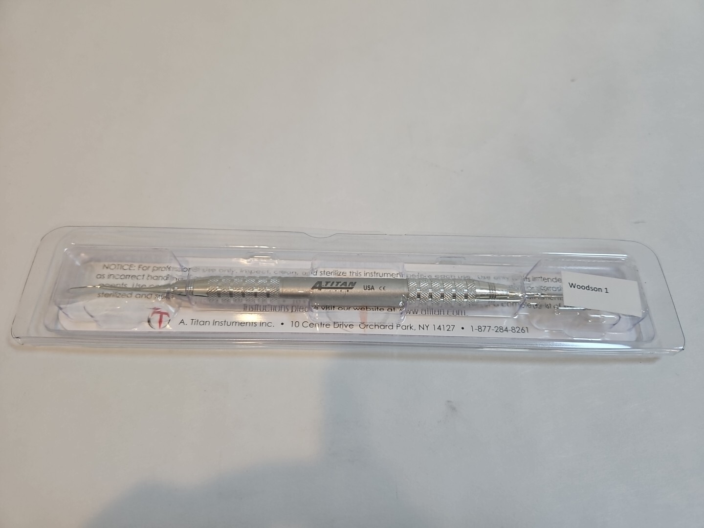 A. Titan Dental Woodson 1 Plastic Filling Instrument USA Instrument