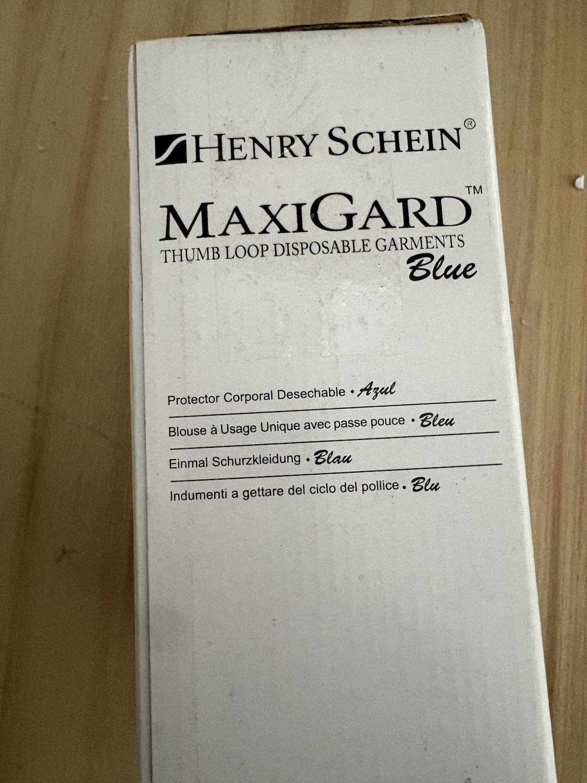 Henry Schein MaxiGard Blue Thumb Loop Disposable Garments Blue. (Box) 104-5806