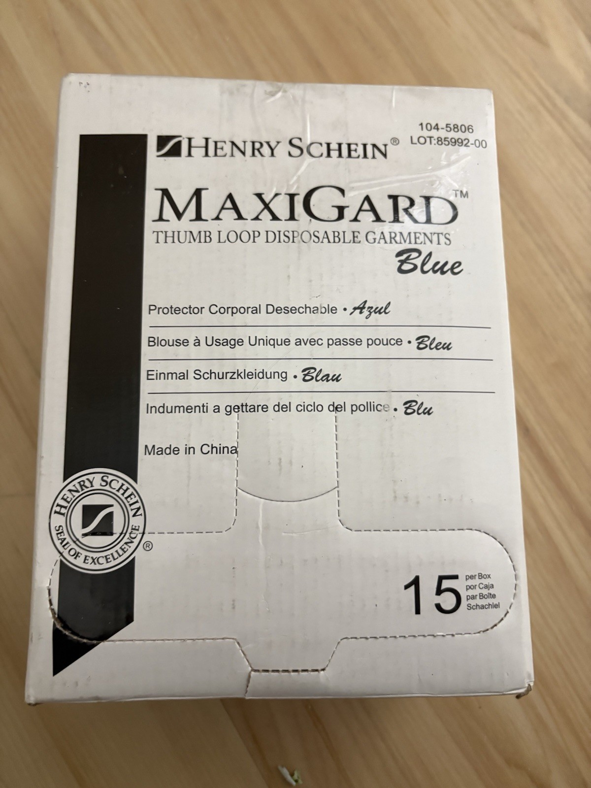 Henry Schein MaxiGard Blue Thumb Loop Disposable Garments Blue. (Box) 104-5806