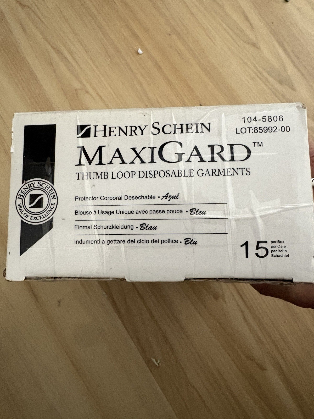 Henry Schein MaxiGard Blue Thumb Loop Disposable Garments Blue. (Box) 104-5806