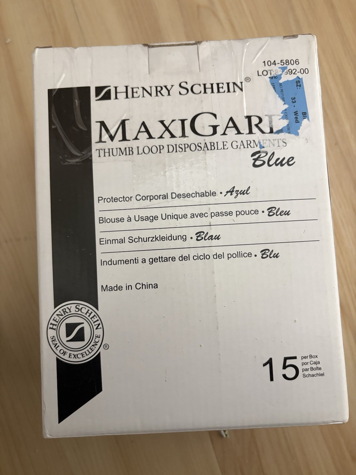 Henry Schein MaxiGard Blue Thumb Loop Disposable Garments Blue. (Box) 104-5806