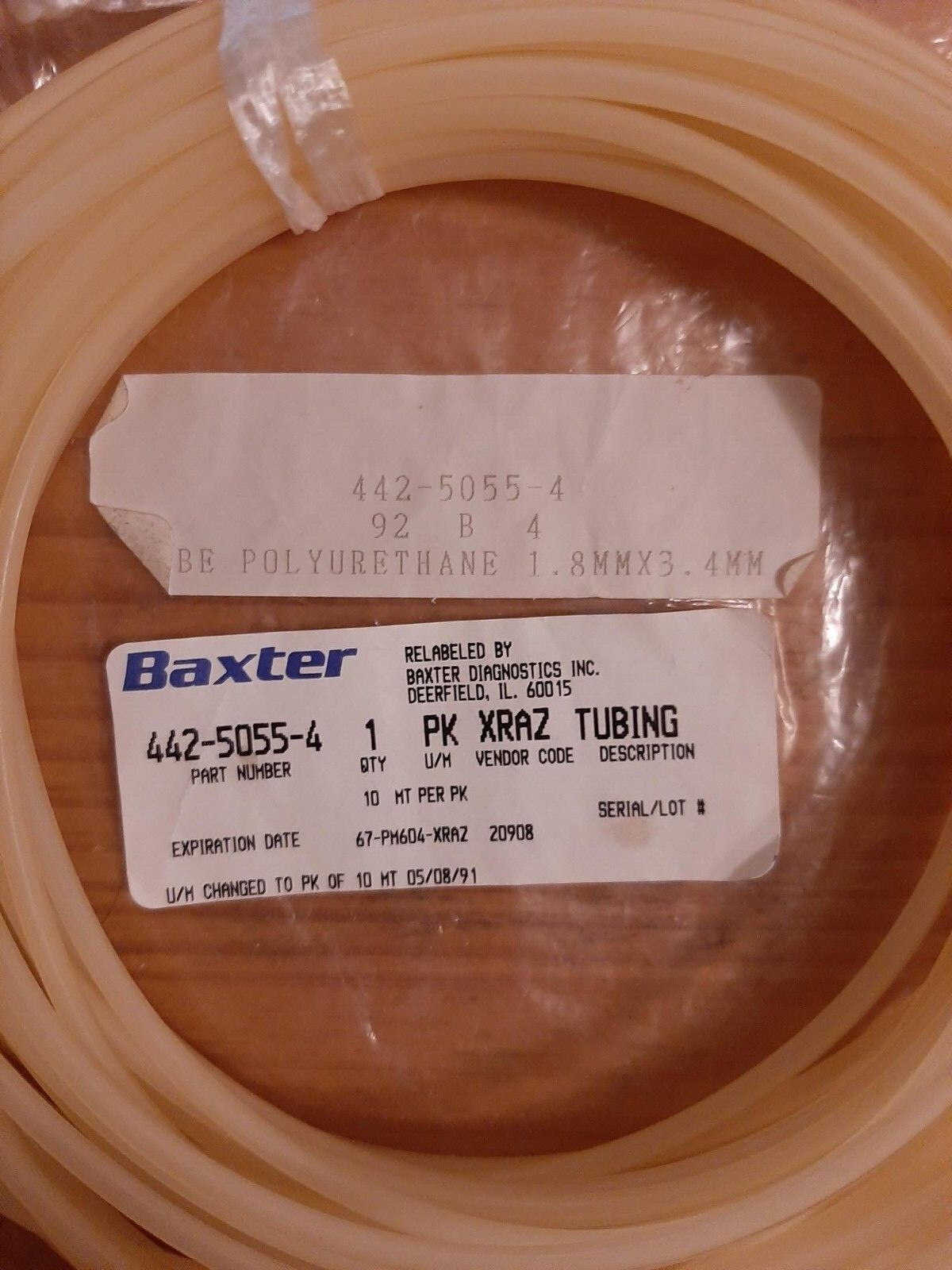 Two pieces of hard polyurethane tubing Baxter part number 442-5055-4