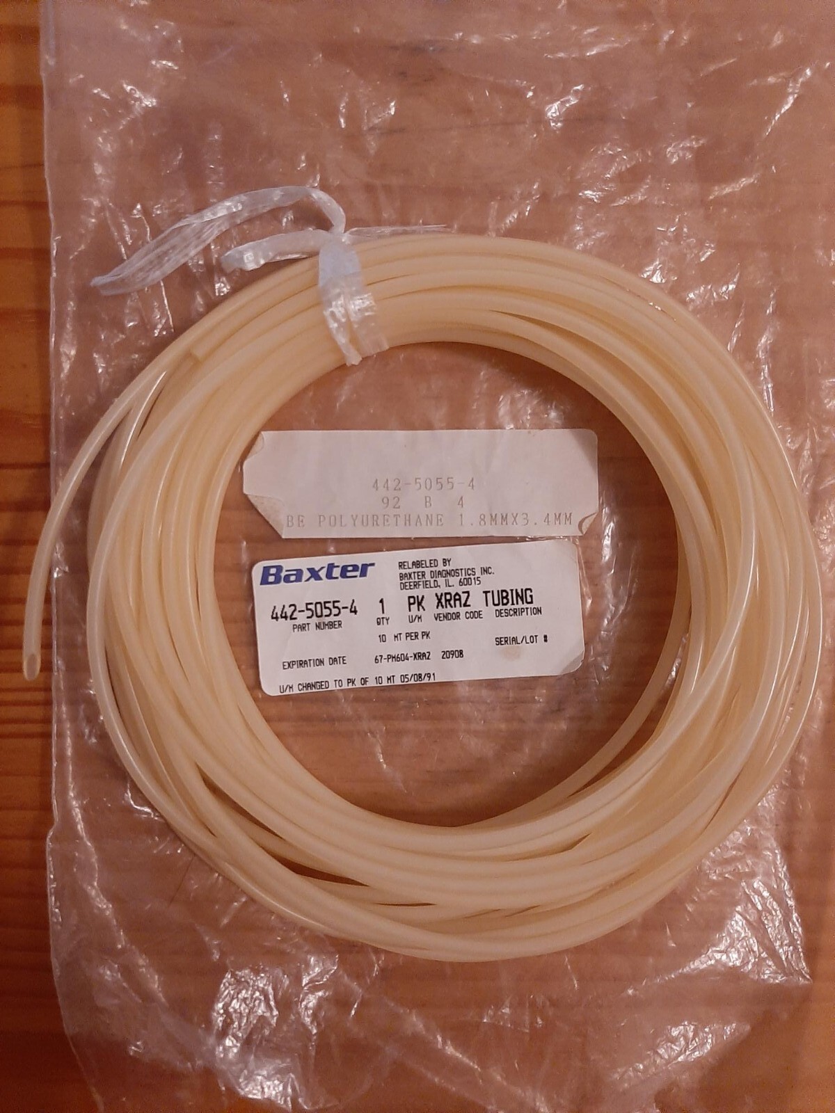 Two pieces of hard polyurethane tubing Baxter part number 442-5055-4